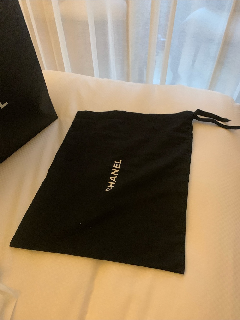 Brand new rare andcollectible authentic Chanel dust bag with strings